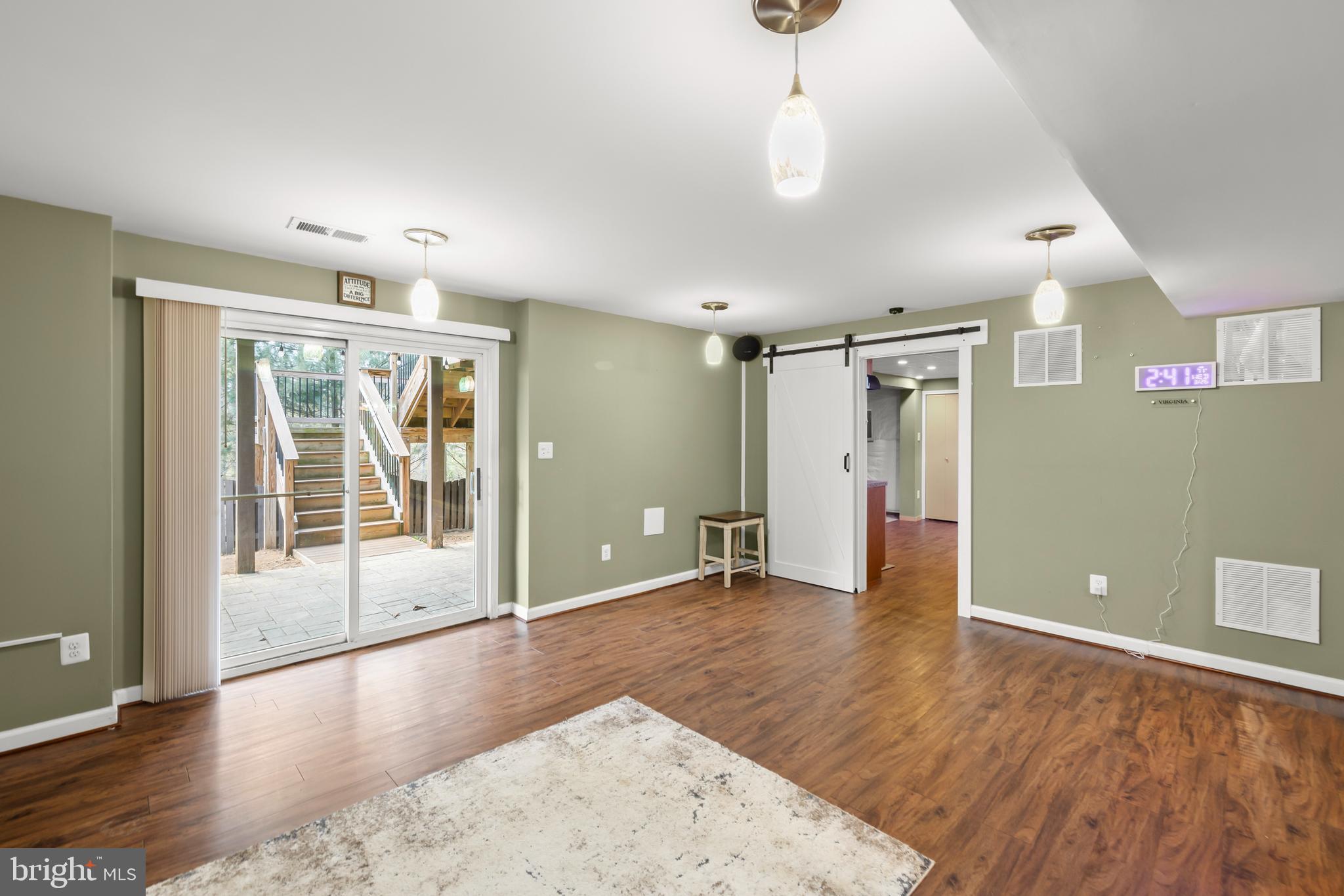 155 Merlot Drive Stephenson, VA 22656 - Photo 48 of 69 a view of an empty room with wooden floor and a window