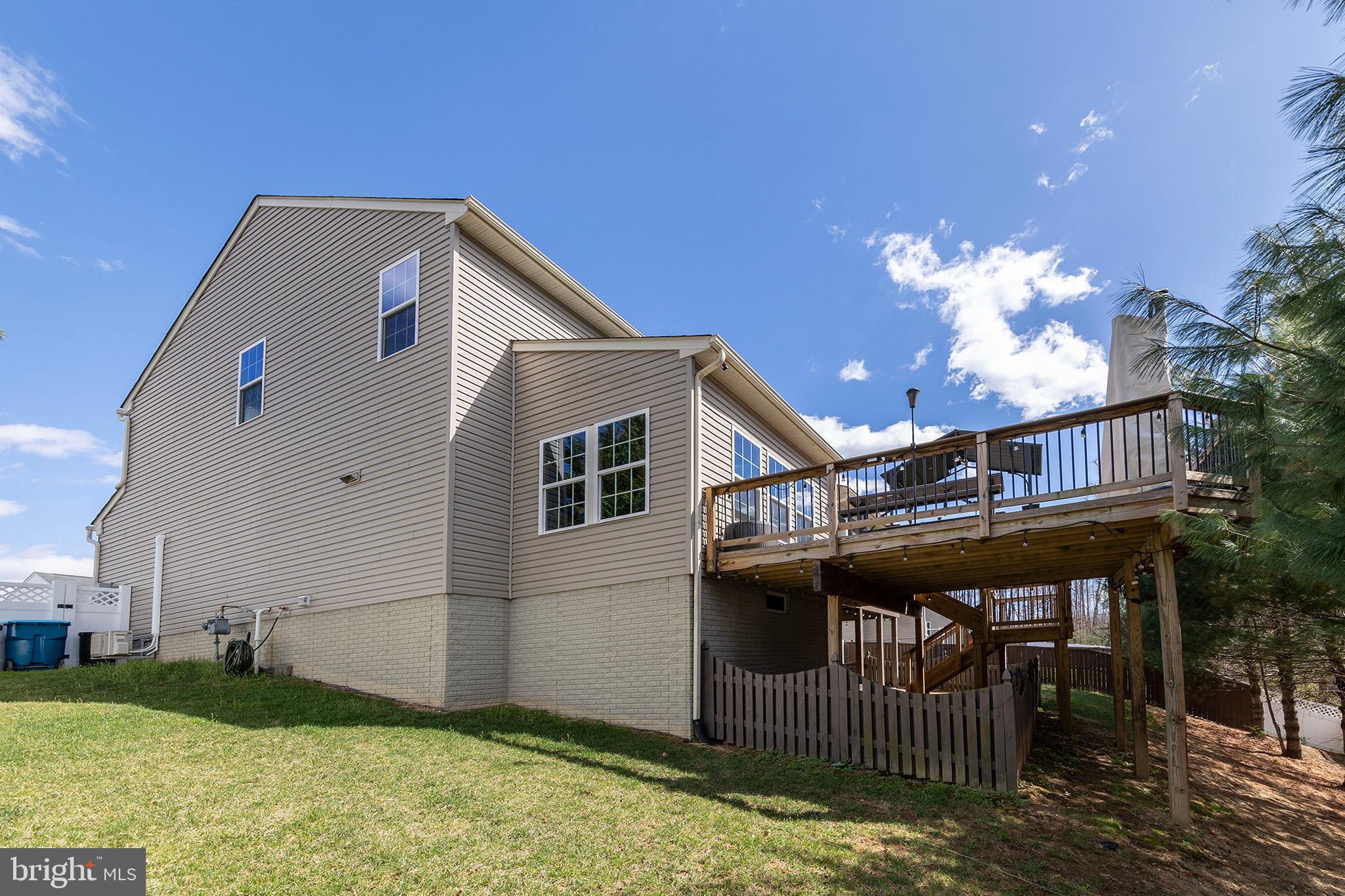 155 Merlot Drive Stephenson, VA 22656 - Photo 65 of 69 a front view of a house with garden