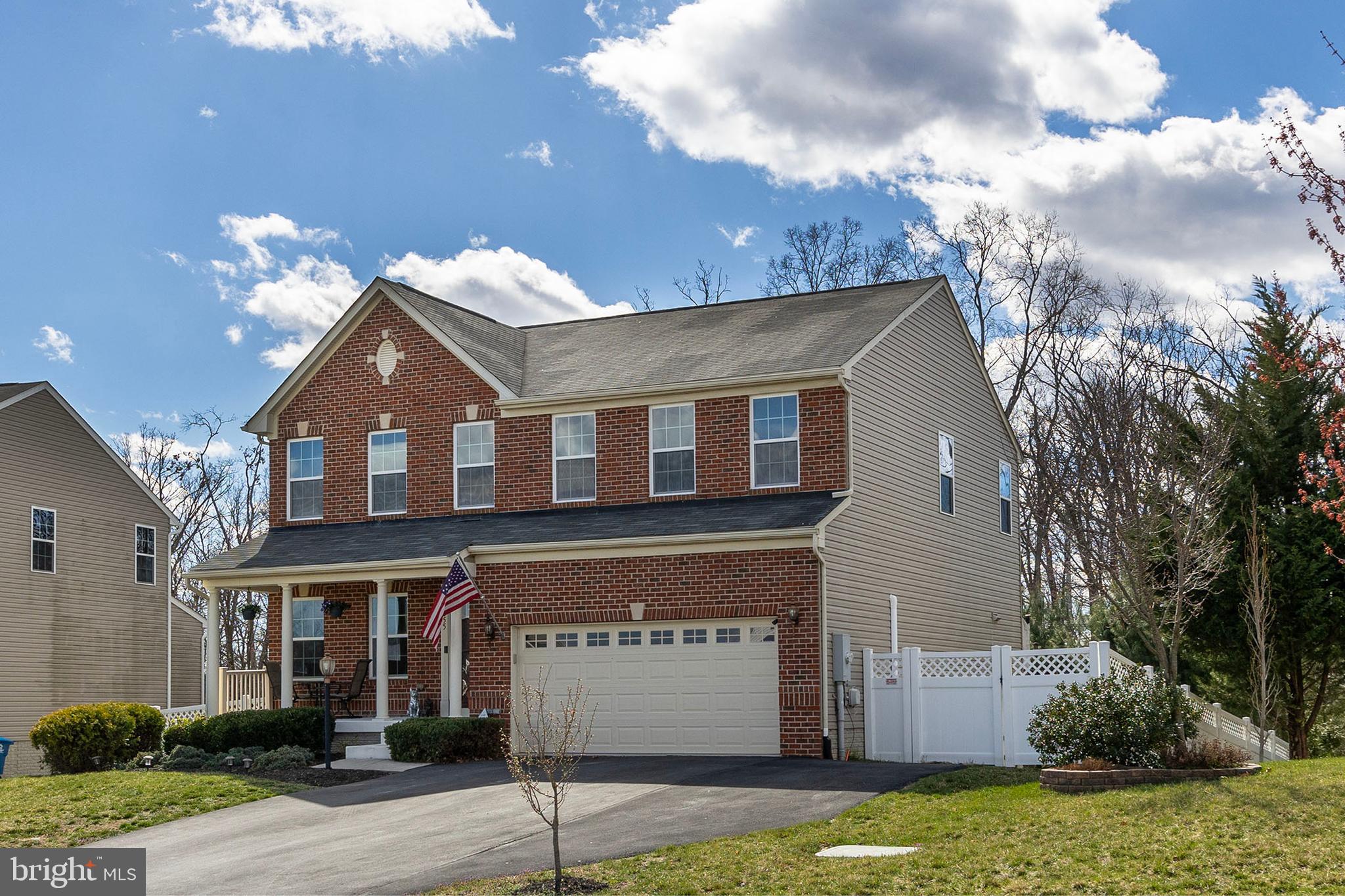 155 Merlot Drive Stephenson, VA 22656 - Photo 67 of 69 a front view of a house with garden