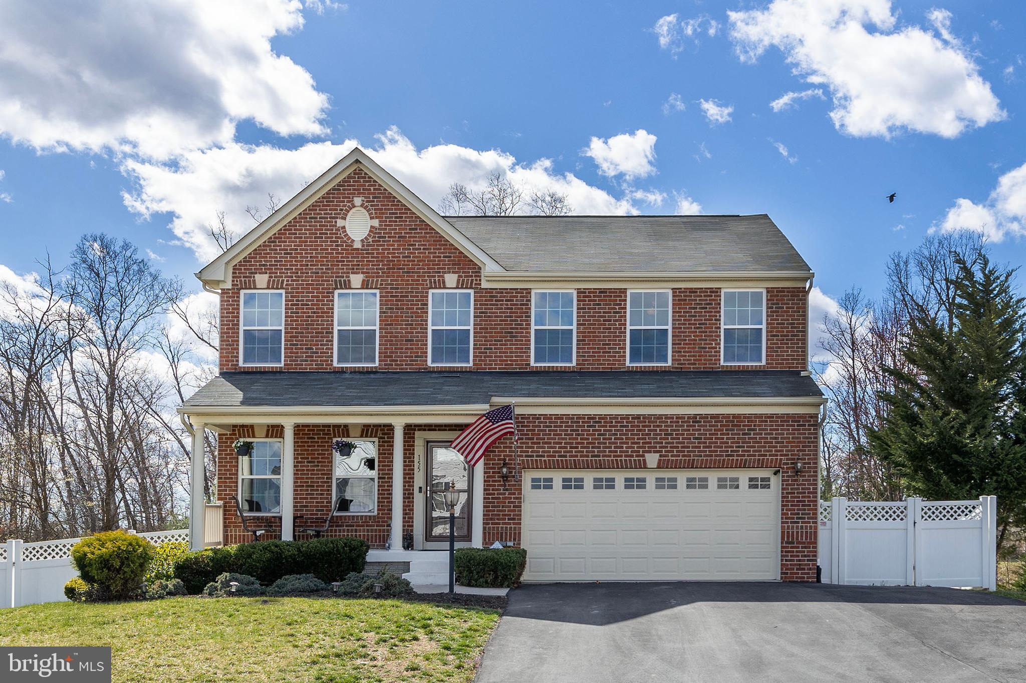 155 Merlot Drive Stephenson, VA 22656 - Photo 68 of 69 a front view of a house with a yard and garage