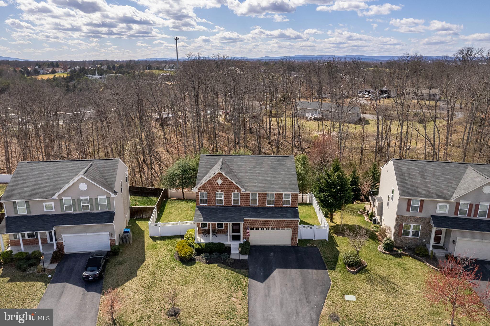 155 Merlot Drive Stephenson, VA 22656 - Photo 8 of 69 an aerial view of a house with a yard swimming pool and mountain view