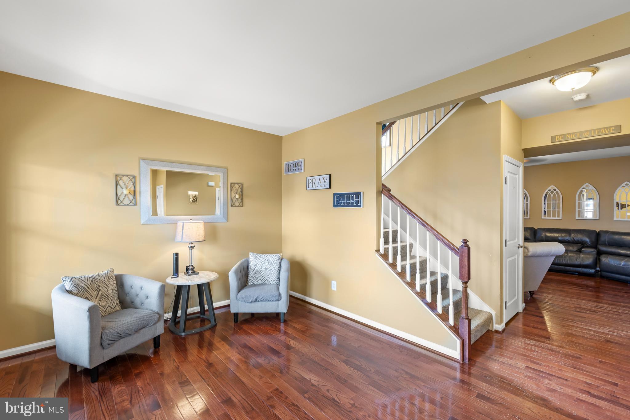 155 Merlot Drive Stephenson, VA 22656 - Photo 10 of 69 a living room with furniture and a wooden floor