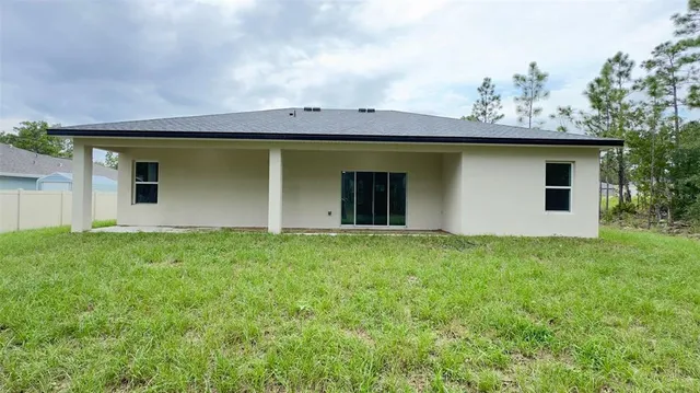 front view of house with a yard