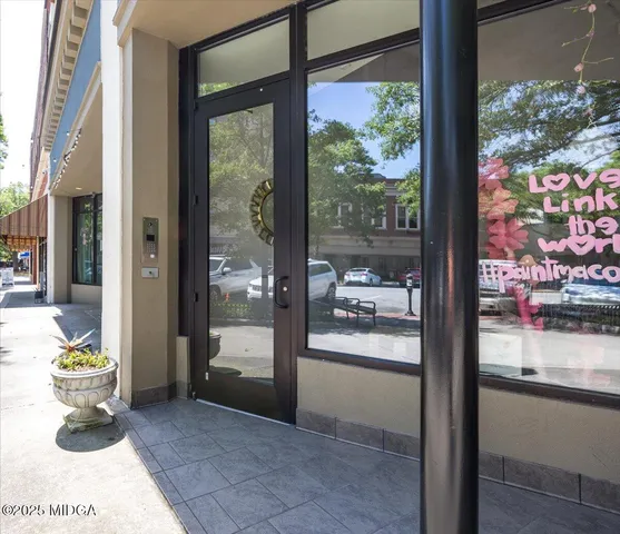 a bathroom with a tub and shower