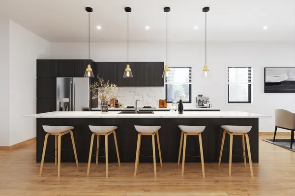 a kitchen with a sink a window and chairs