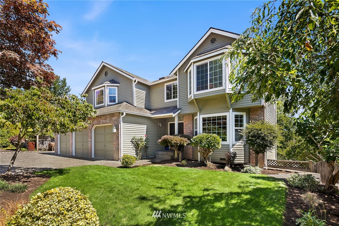 515 224 Place Southeast Bothell, WA 98021 - Photo 1 of 1 a front view of a house with garden