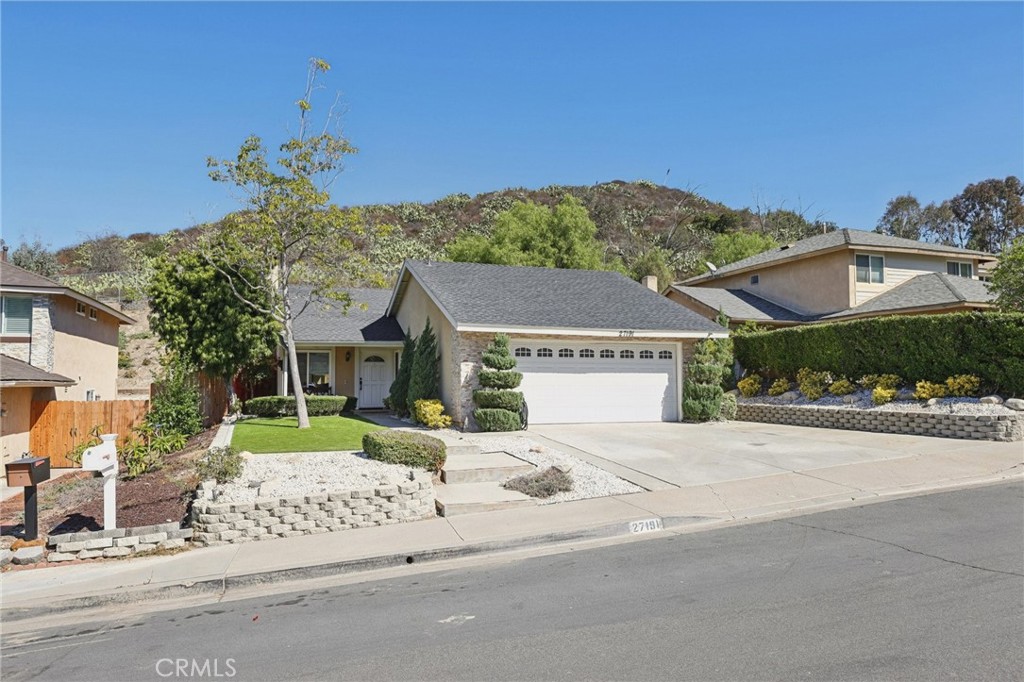 front view of a house with a street