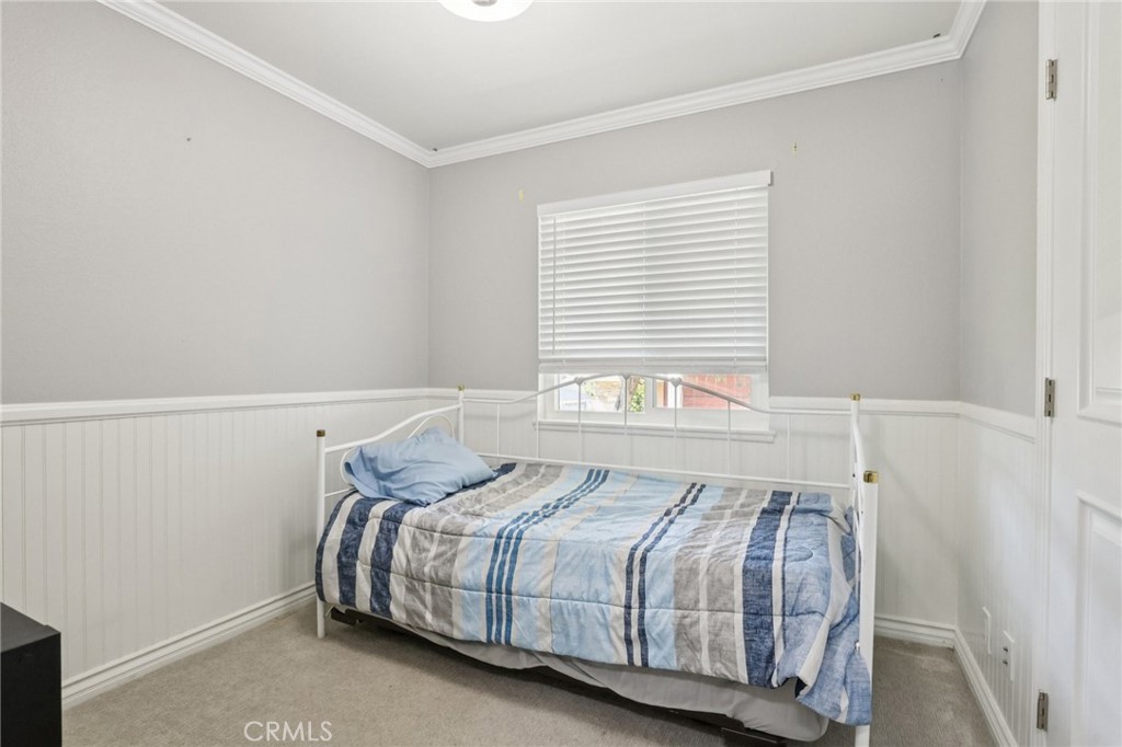 27191 Valleymont Road Lake Forest, CA 92630 - Photo 21 of 37 a bedroom with a bed and a window