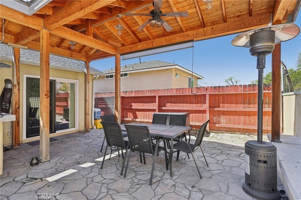 27191 Valleymont Road Lake Forest, CA 92630 - Photo 25 of 37 a view of a patio with a table and chairs