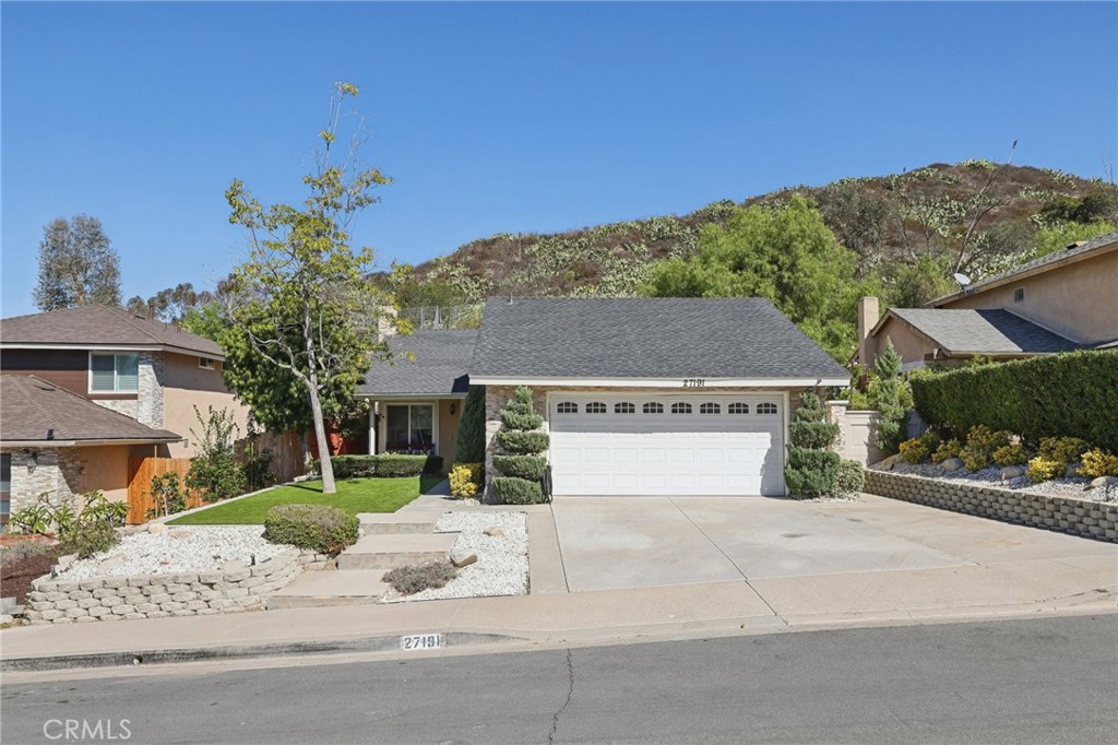 27191 Valleymont Road Lake Forest, CA 92630 - Photo 4 of 37 front view of a house with a yard