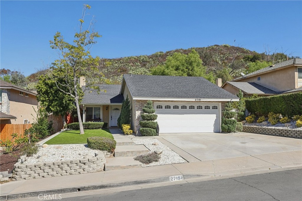 27191 Valleymont Road Lake Forest, CA 92630 - Photo 5 of 37 a view of a house with a yard