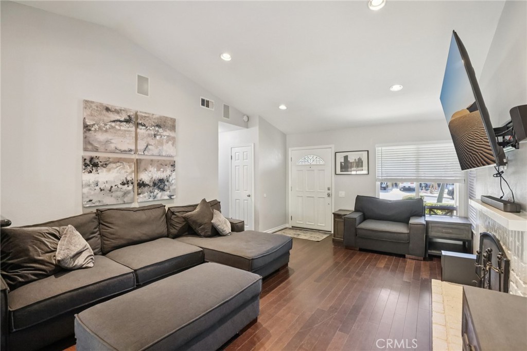 27191 Valleymont Road Lake Forest, CA 92630 - Photo 8 of 37 a living room with furniture and wooden floor