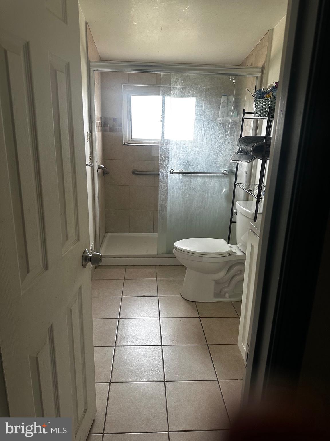 6110 Talles Road Baltimore, MD 21207 - Photo 13 of 31 a bathroom with a sink and a toilet
