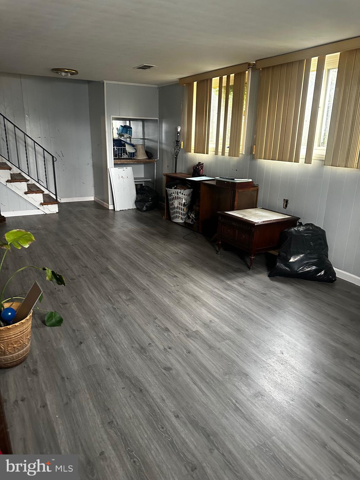 6110 Talles Road Baltimore, MD 21207 - Photo 3 of 31 a living room with furniture and a wooden floor