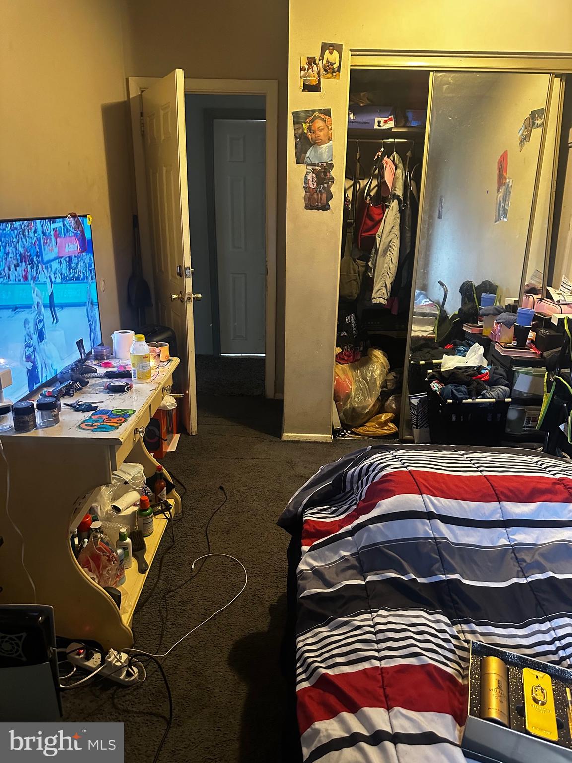 6110 Talles Road Baltimore, MD 21207 - Photo 9 of 31 a room with gym equipment and a mirror