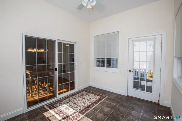 a view of empty room with windows