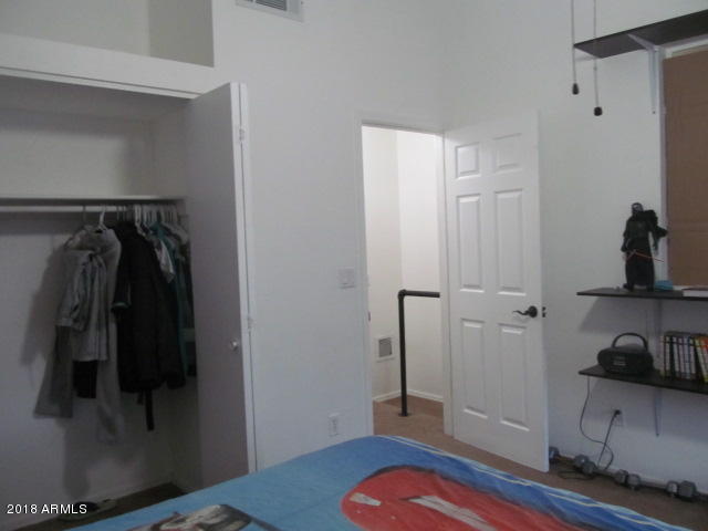 7905 West Thunderbird Road, Unit 308 Peoria, AZ 85381 - Photo 5 of 18 guest bedroom looking out