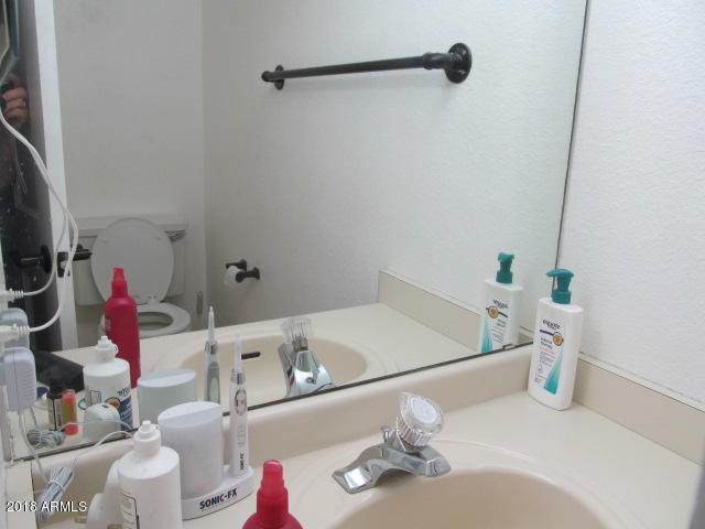 7905 West Thunderbird Road, Unit 308 Peoria, AZ 85381 - Photo 7 of 18 Half bath downstairs