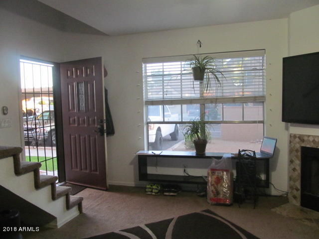7905 West Thunderbird Road, Unit 308 Peoria, AZ 85381 - Photo 10 of 18 Living Room looking out