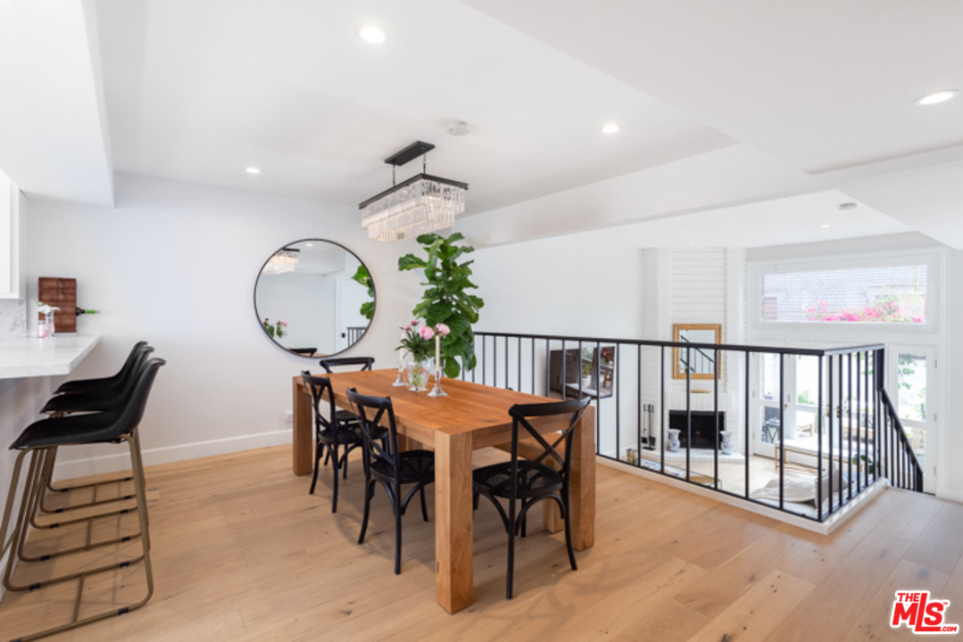 4425 Alla Road, Unit 6 Marina del Rey, CA 90292 - Photo 11 of 35 a view of a dining room and hall with wooden floor