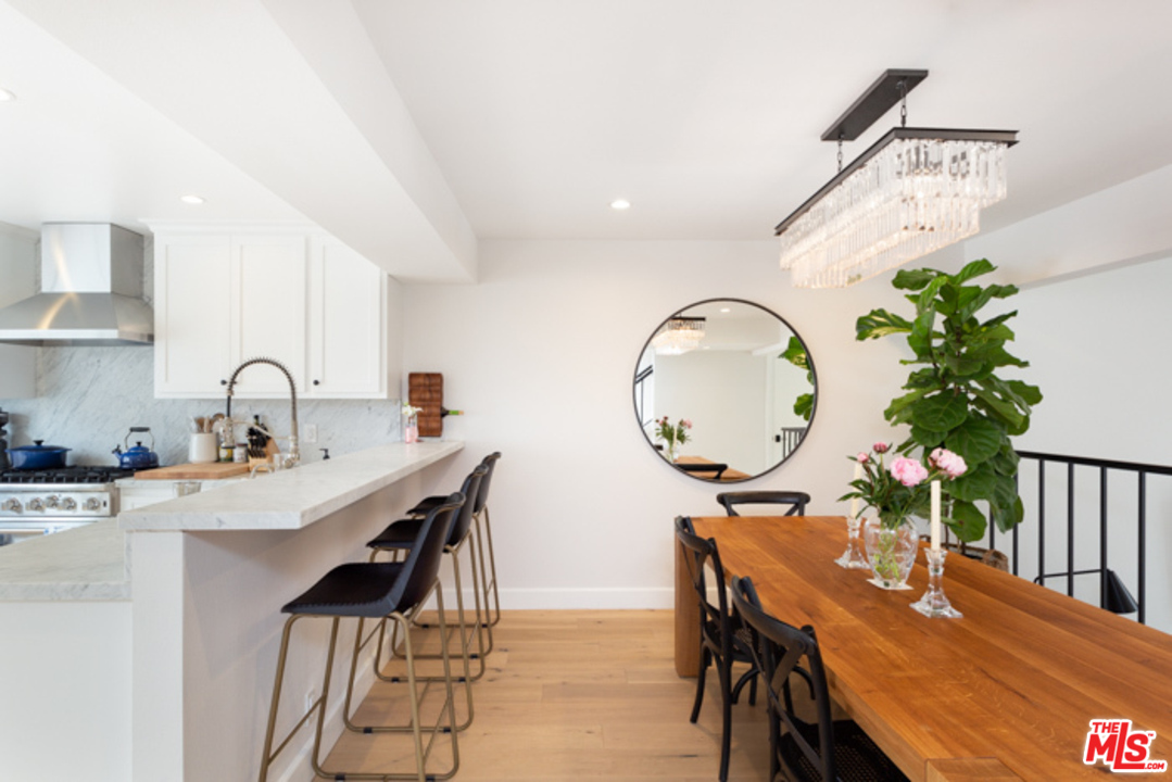 4425 Alla Road, Unit 6 Marina del Rey, CA 90292 - Photo 12 of 35 a view of a dining room with furniture