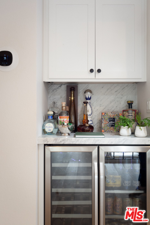 4425 Alla Road, Unit 6 Marina del Rey, CA 90292 - Photo 16 of 35 a kitchen with a refrigerator and cabinets