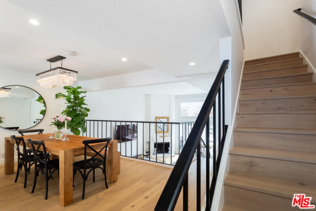 4425 Alla Road, Unit 6 Marina del Rey, CA 90292 - Photo 19 of 35 a view of a dining room with furniture and wooden floor