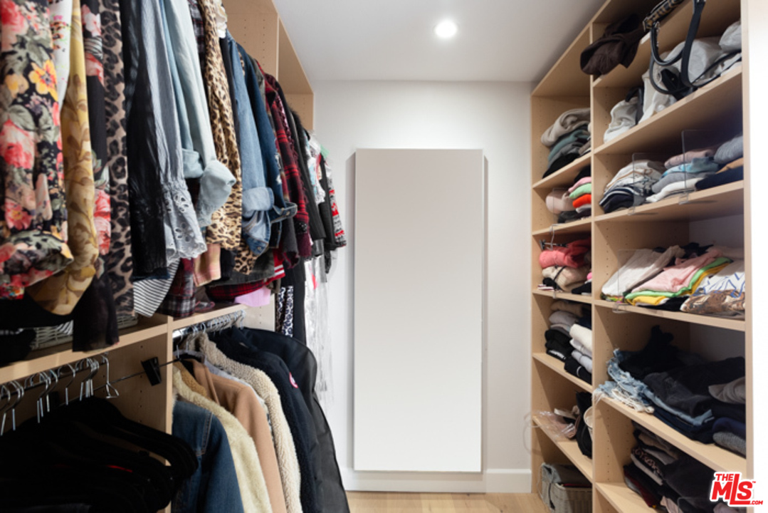 4425 Alla Road, Unit 6 Marina del Rey, CA 90292 - Photo 25 of 35 a view of walk in closet with clothes and shoes