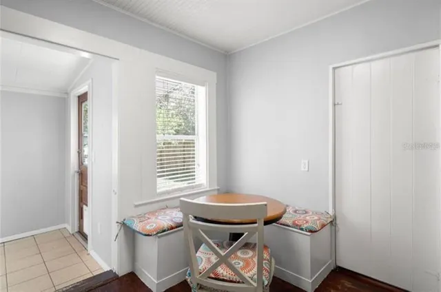 a room with furniture and a window