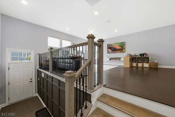 a view of livingroom with furniture and stairs