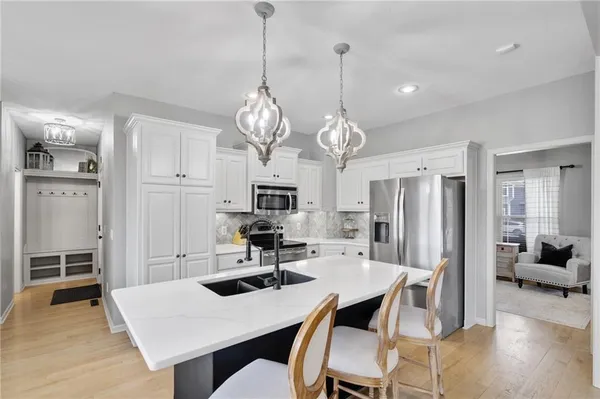 $525,000 | 1303 Ashdown Circle, Raymore, MO 64083