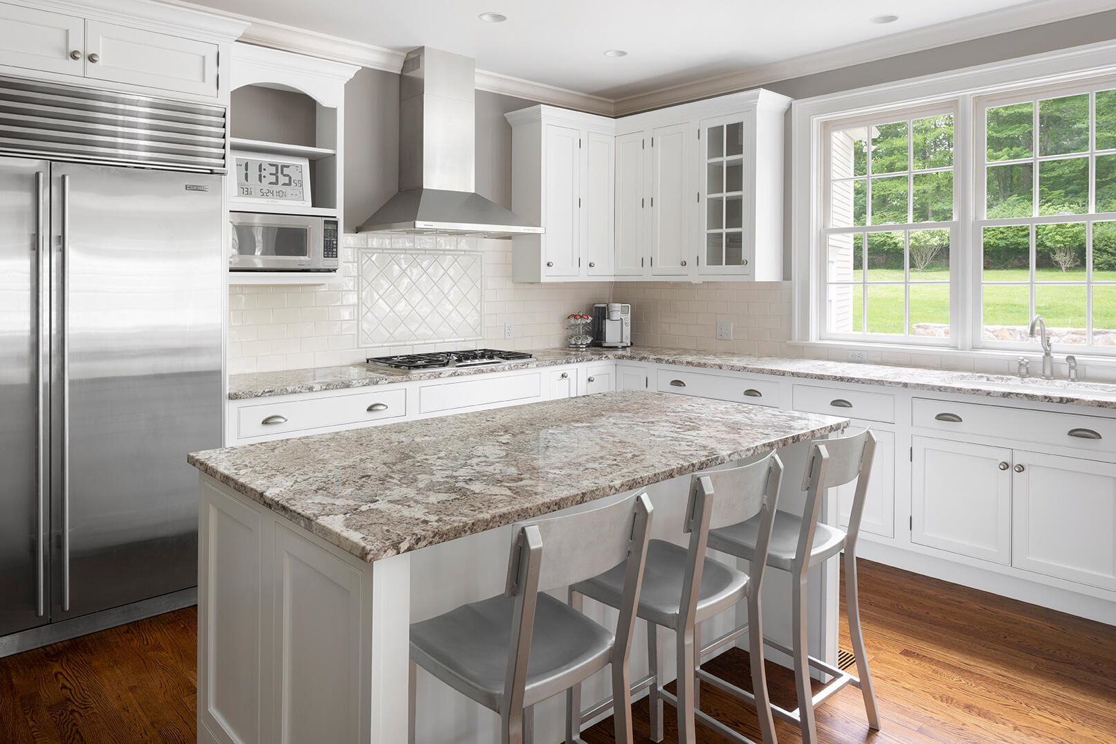 21 Briar Brae Road Darien, CT 06820 - Photo 13 of 35 a kitchen with stainless steel appliances granite countertop a kitchen island a stove a cabinets and a sink