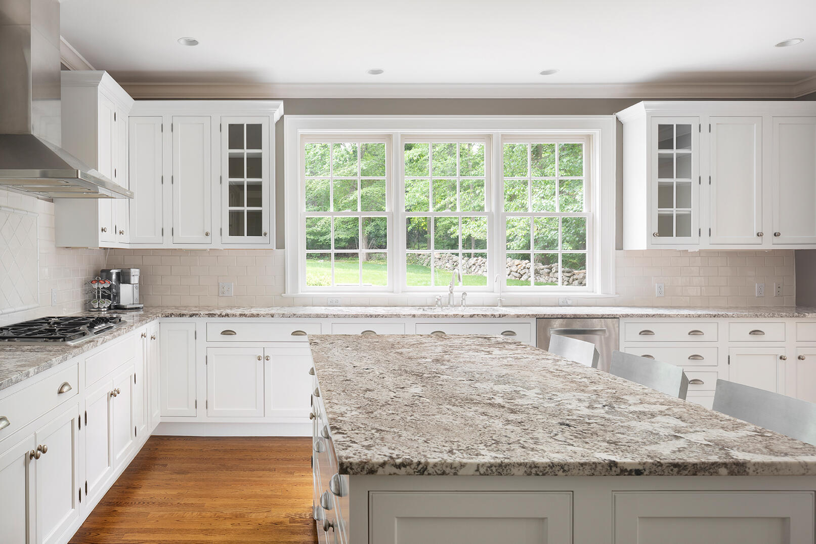 21 Briar Brae Road Darien, CT 06820 - Photo 14 of 35 a kitchen with granite countertop sink and cabinets