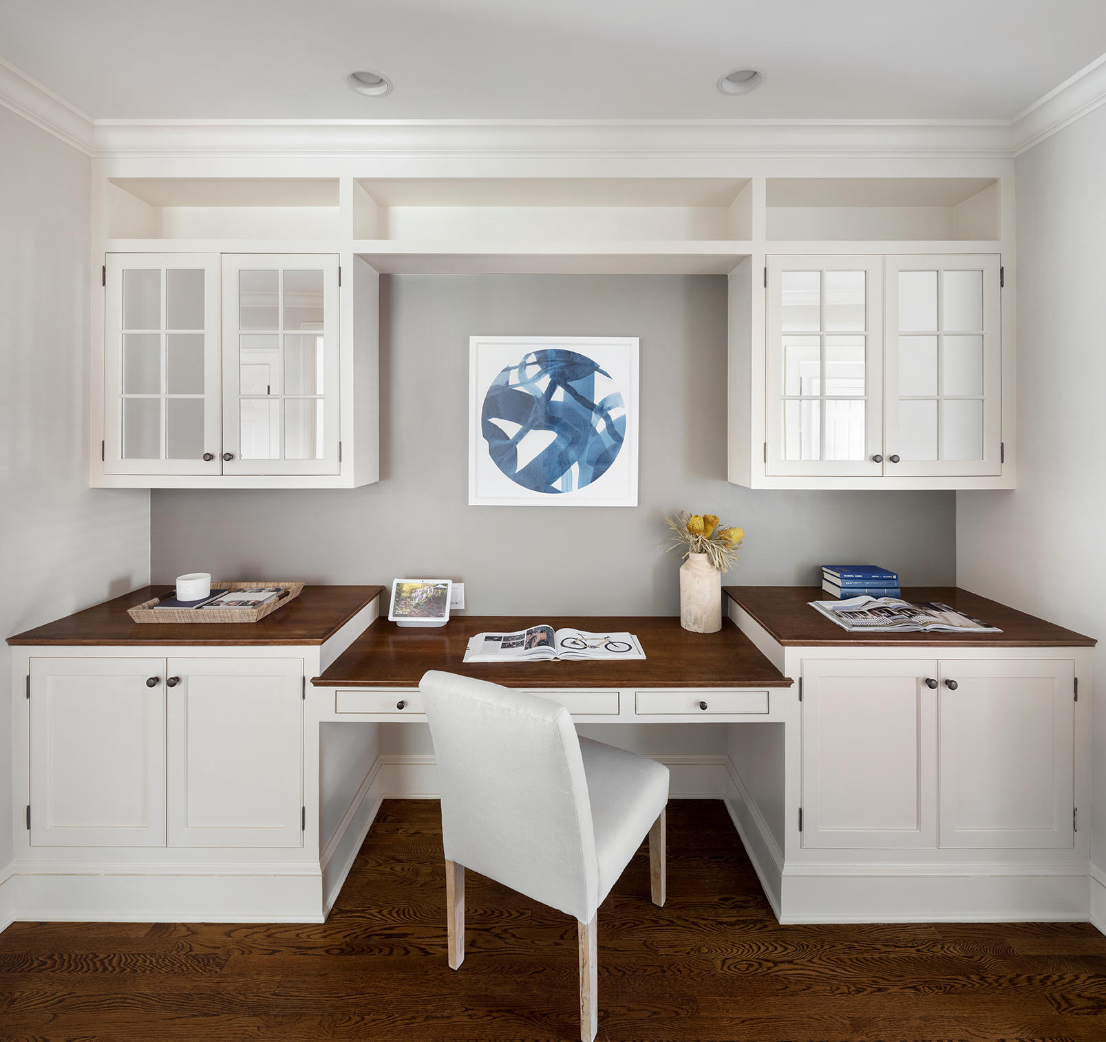 21 Briar Brae Road Darien, CT 06820 - Photo 15 of 35 a kitchen with stainless steel appliances white cabinets and wooden floor