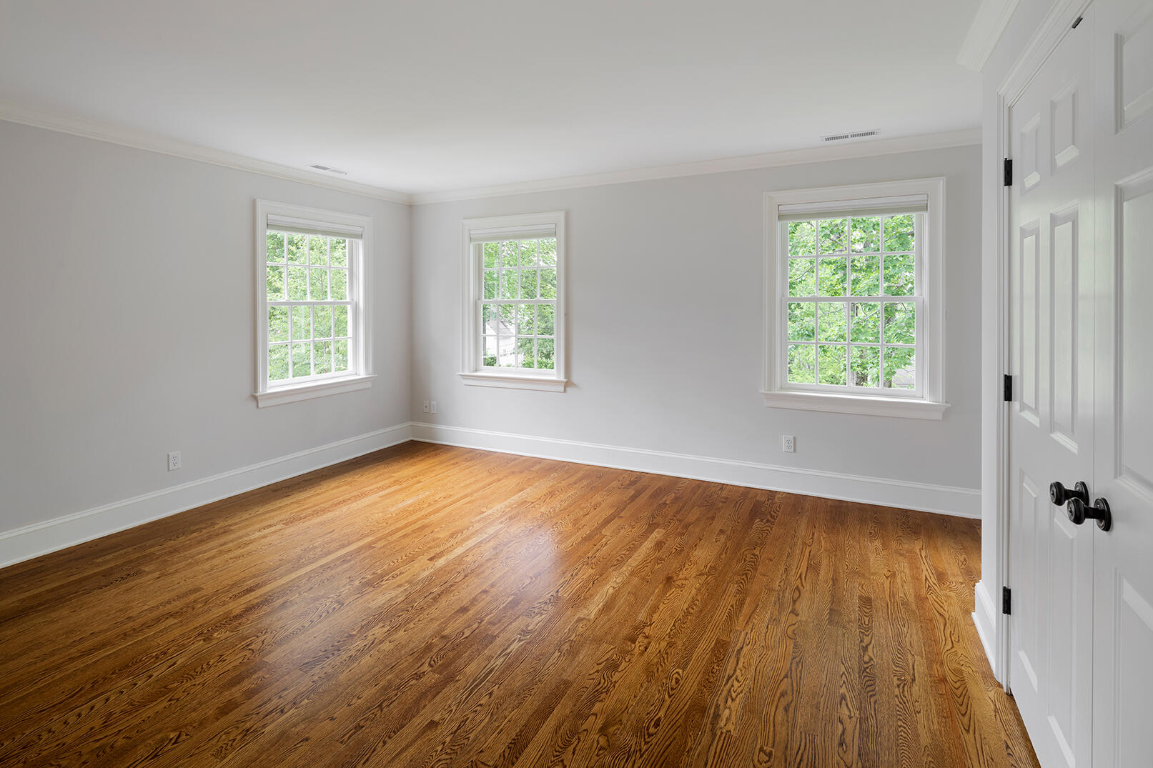 21 Briar Brae Road Darien, CT 06820 - Photo 29 of 35 a view of an empty room with wooden floor and a window