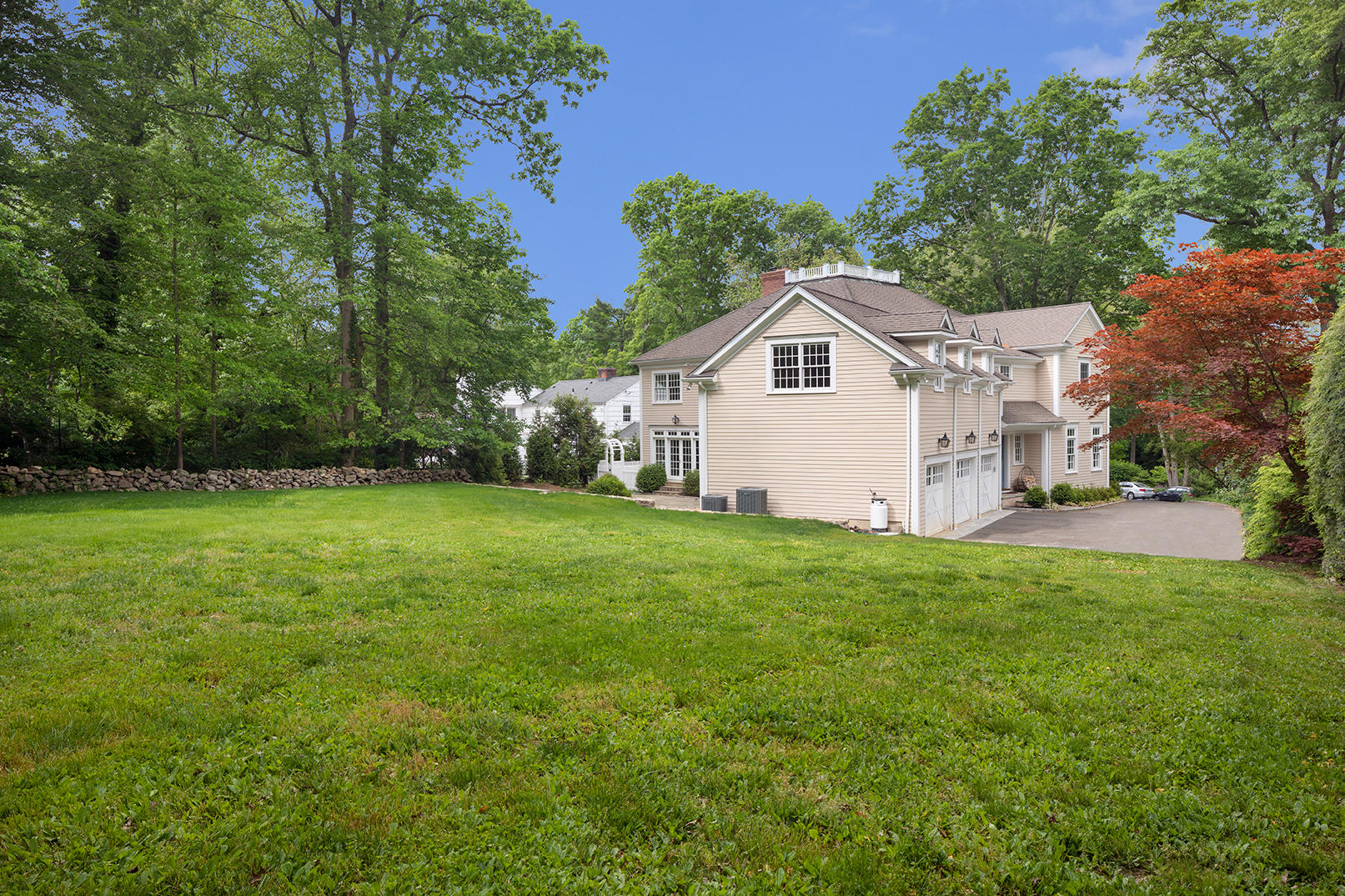 21 Briar Brae Road Darien, CT 06820 - Photo 34 of 35 a view of a house with yard and a garden