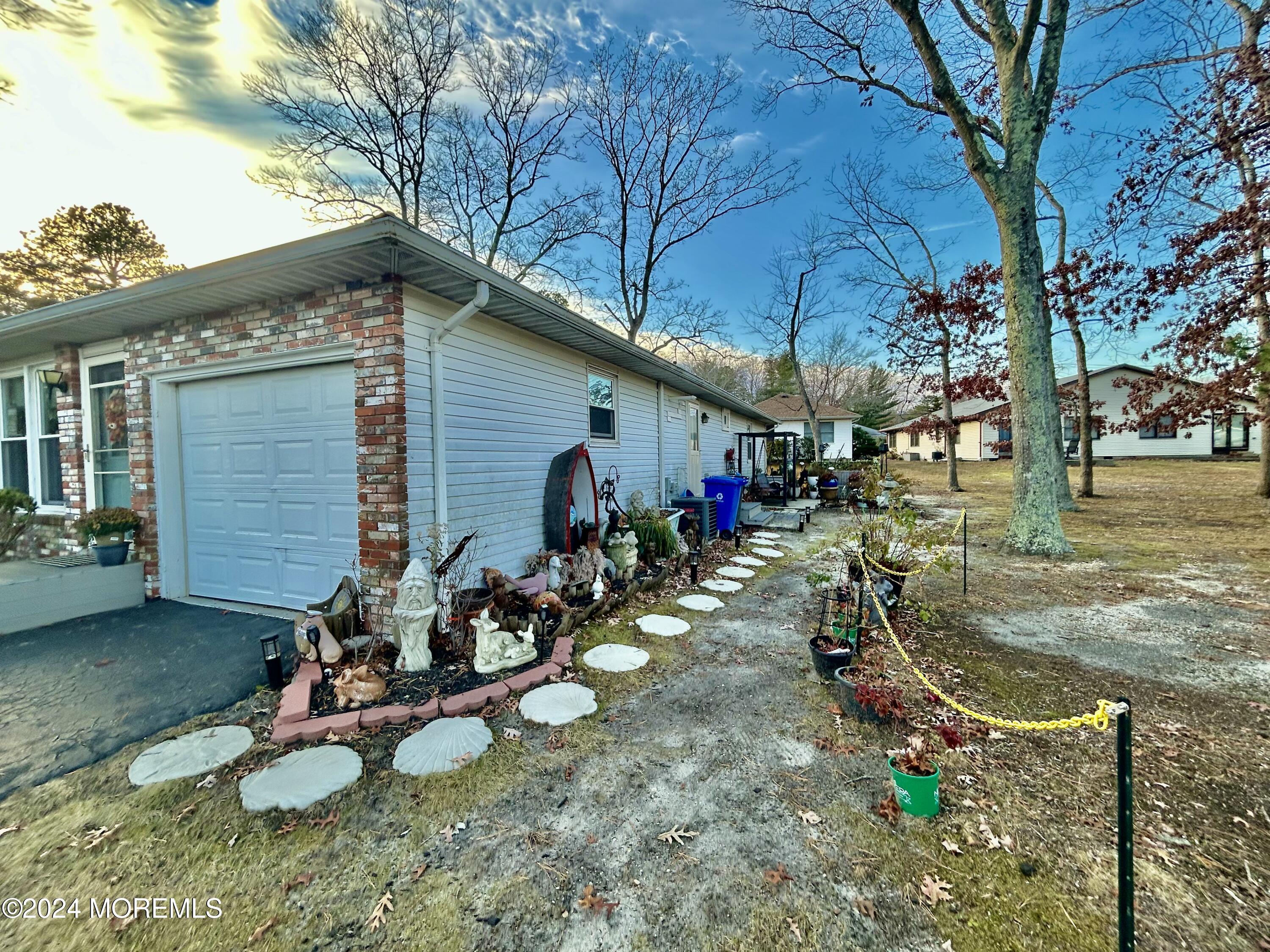 14 Walnut Road Manahawkin, NJ 08050 - Photo 27 of 33 stepping stones to patio