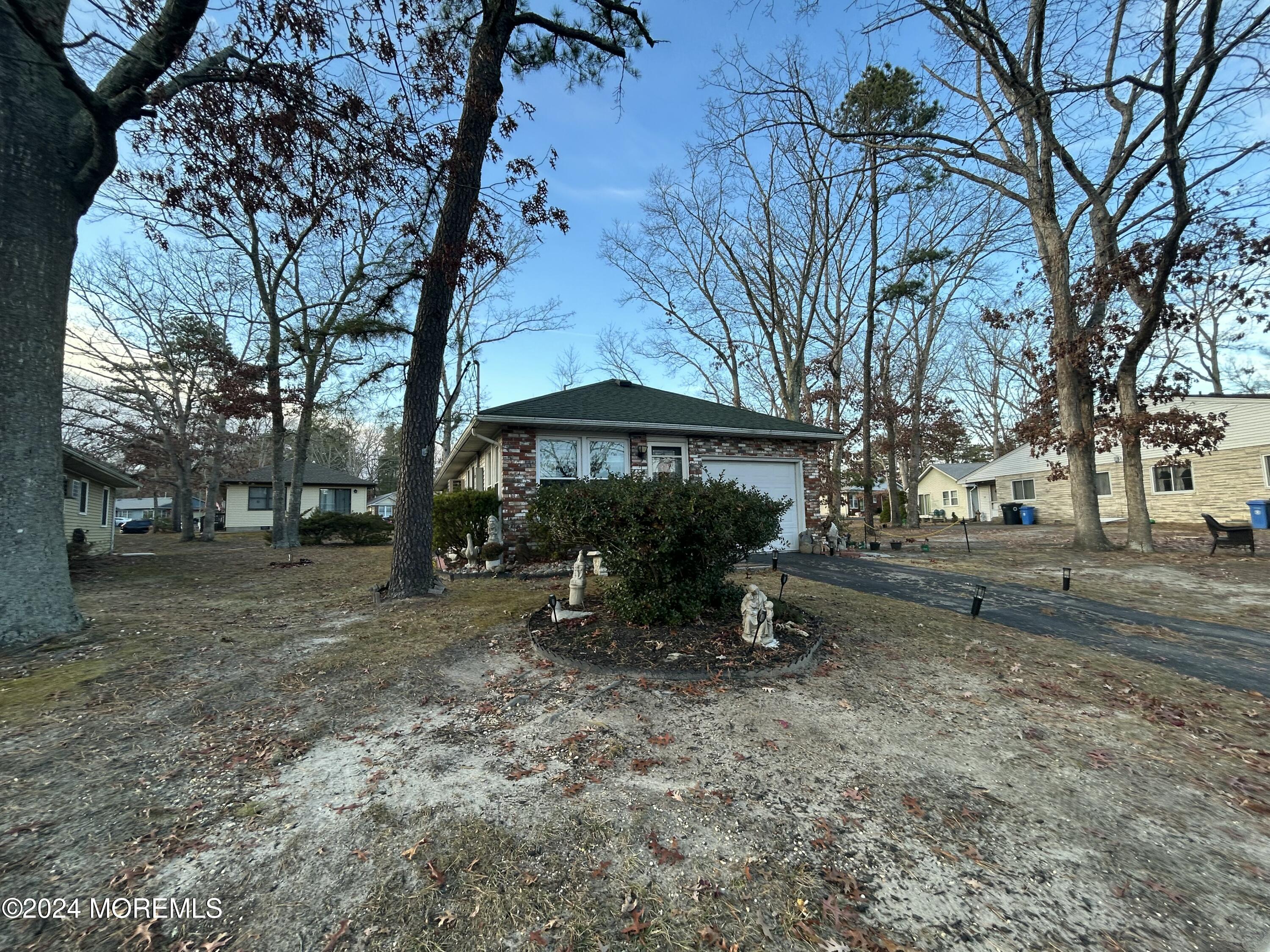 14 Walnut Road Manahawkin, NJ 08050 - Photo 29 of 33 nestled under trees for shade