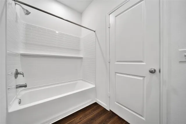 a bathroom with a bathtub