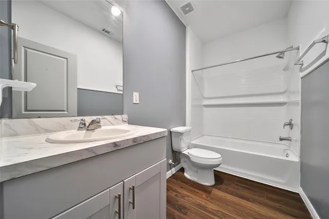 a bathroom with a sink and a toilet