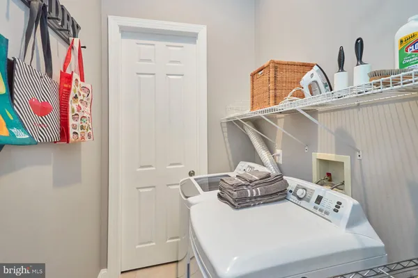 a white room with a rug