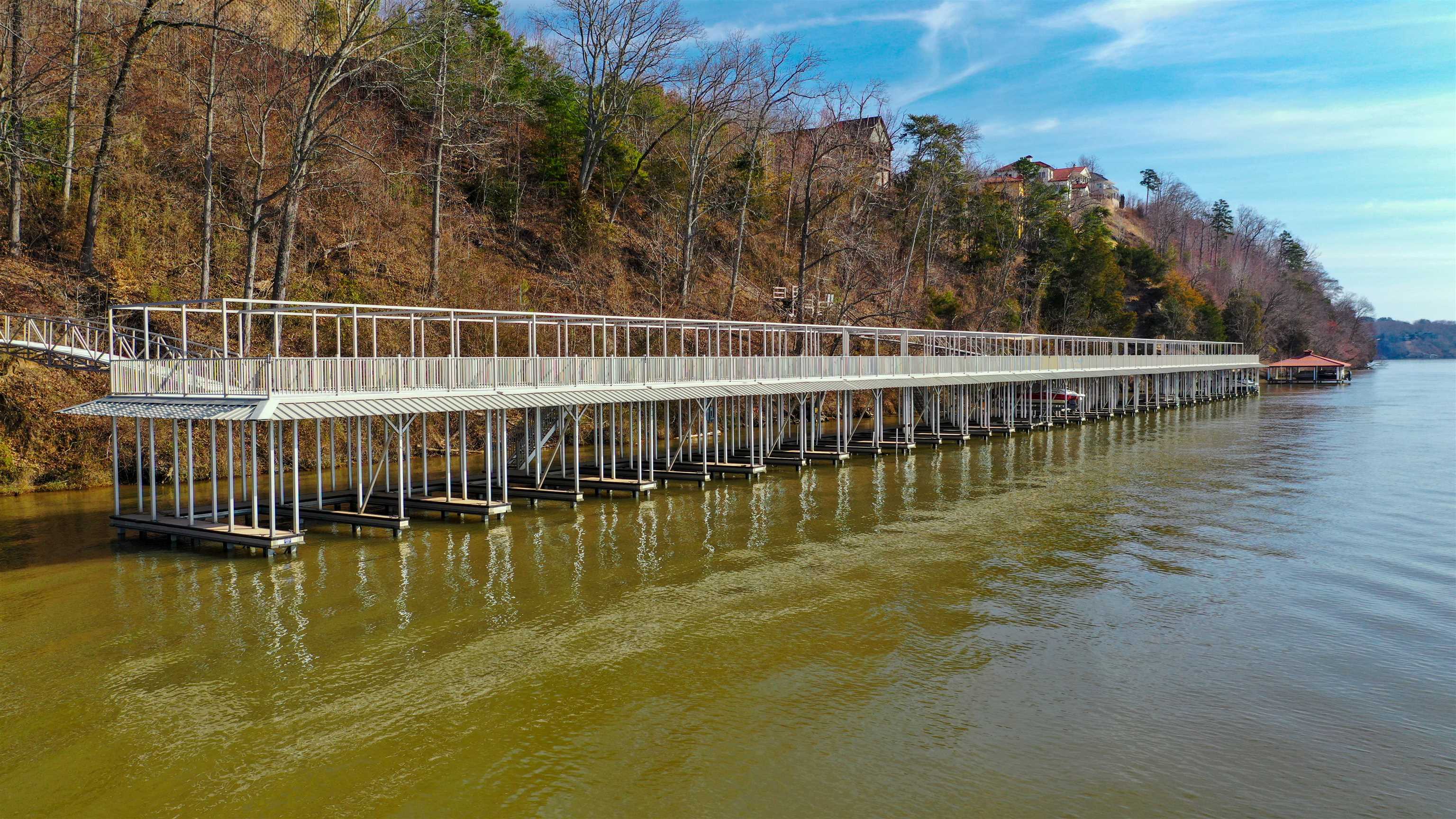 7 High Pointe Drive Savannah, TN 38372 - Photo 3 of 3 Dock area featuring a water view and a wooded view
