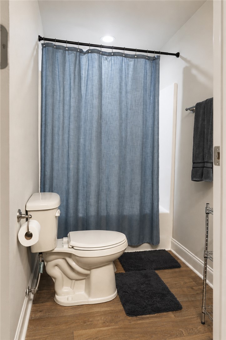 102 Ventura Street Anderson, SC 29621 - Photo 19 of 24 Functional full bathroom featuring wood-look flooring and recessed lighting.