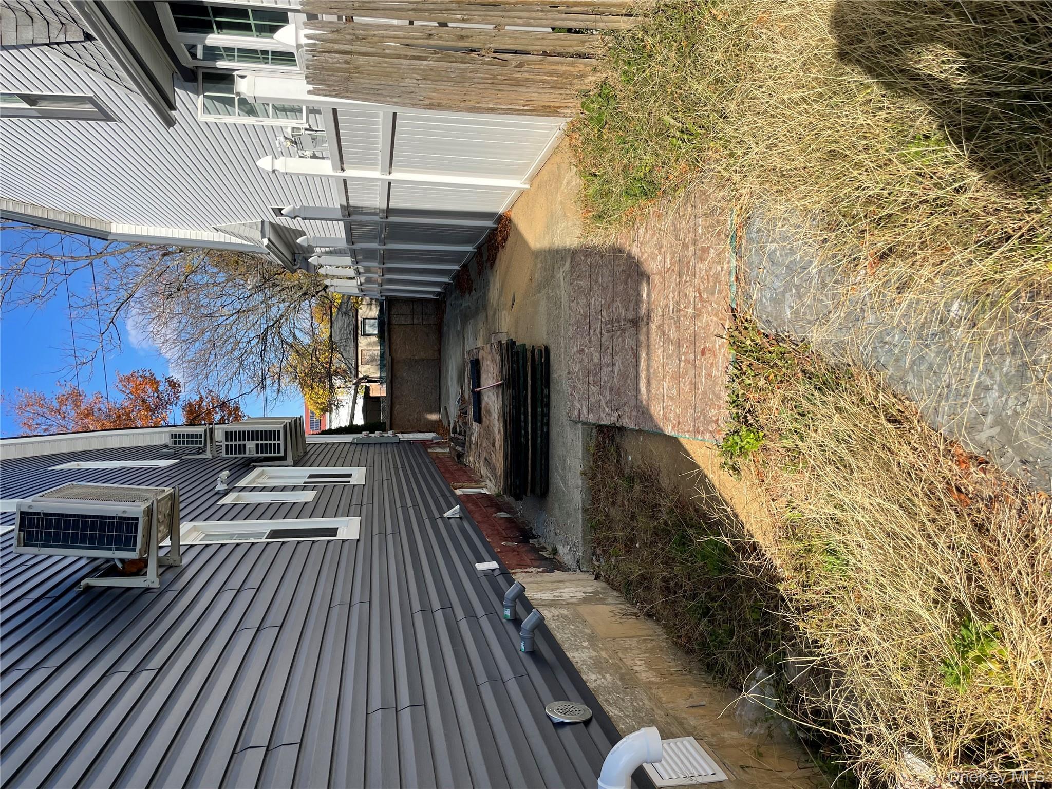 131-08 Sutter Avenue Queens, NY 11420 - Photo 20 of 21 a view of a backyard with a tree