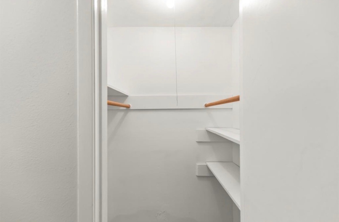 7515 Jason Street Houston, TX 77074 - Photo 17 of 24 a view of small space with racks on the wall