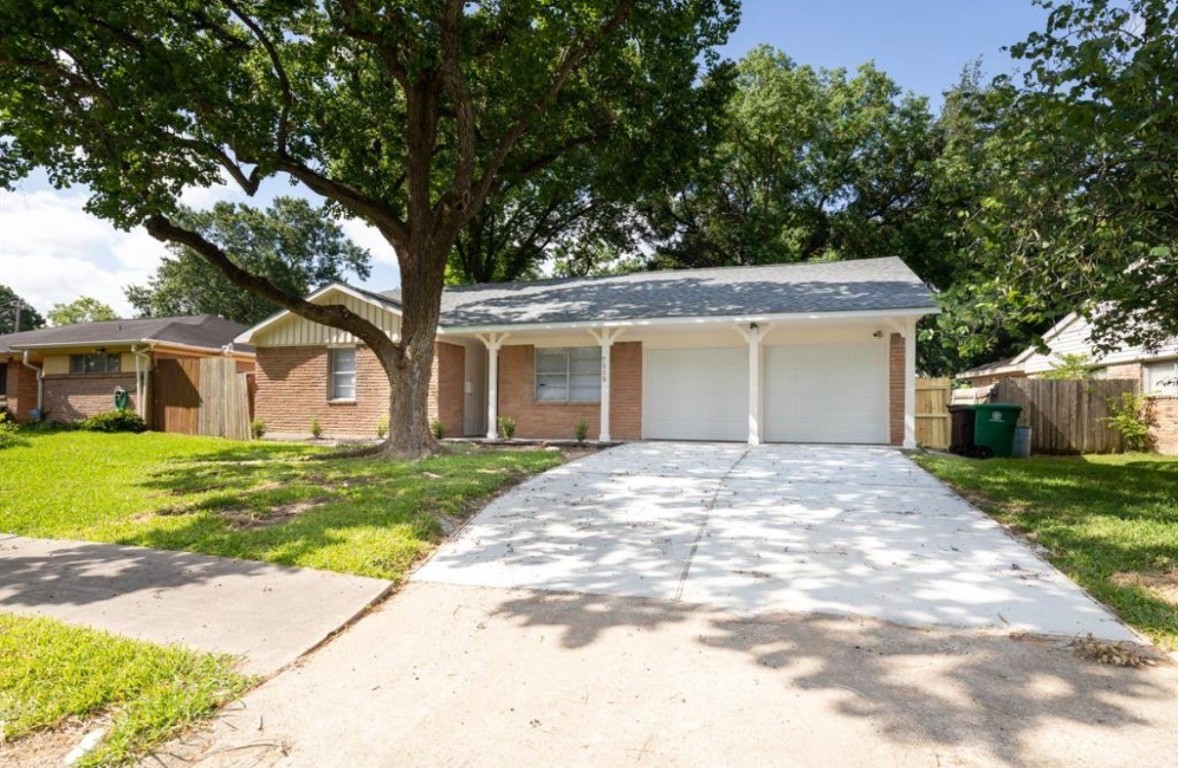 7515 Jason Street Houston, TX 77074 - Photo 2 of 24 a view of a house with a yard