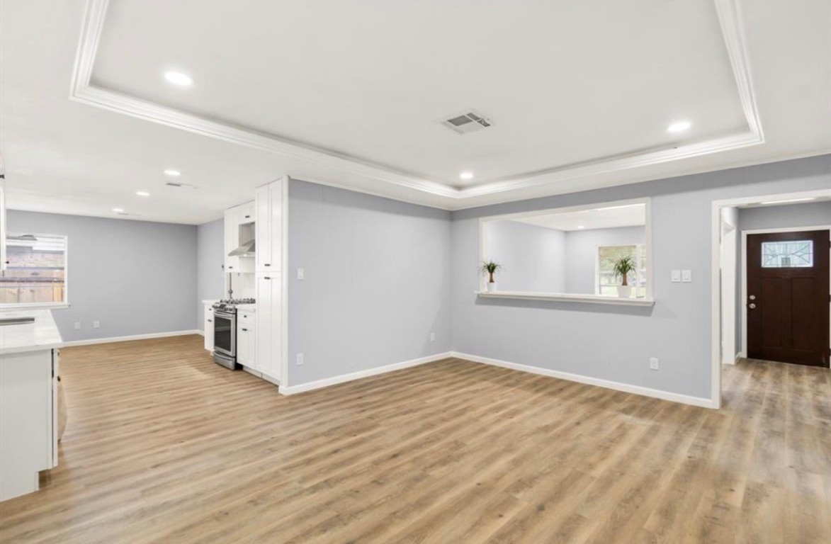7515 Jason Street Houston, TX 77074 - Photo 8 of 24 a view of empty room with wooden floor