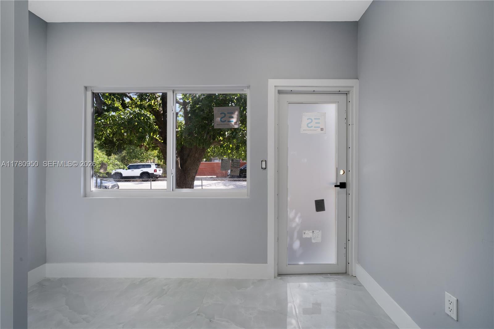 1114 Southwest 13th Court Miami, FL 33135 - Photo 13 of 43 view of room with window