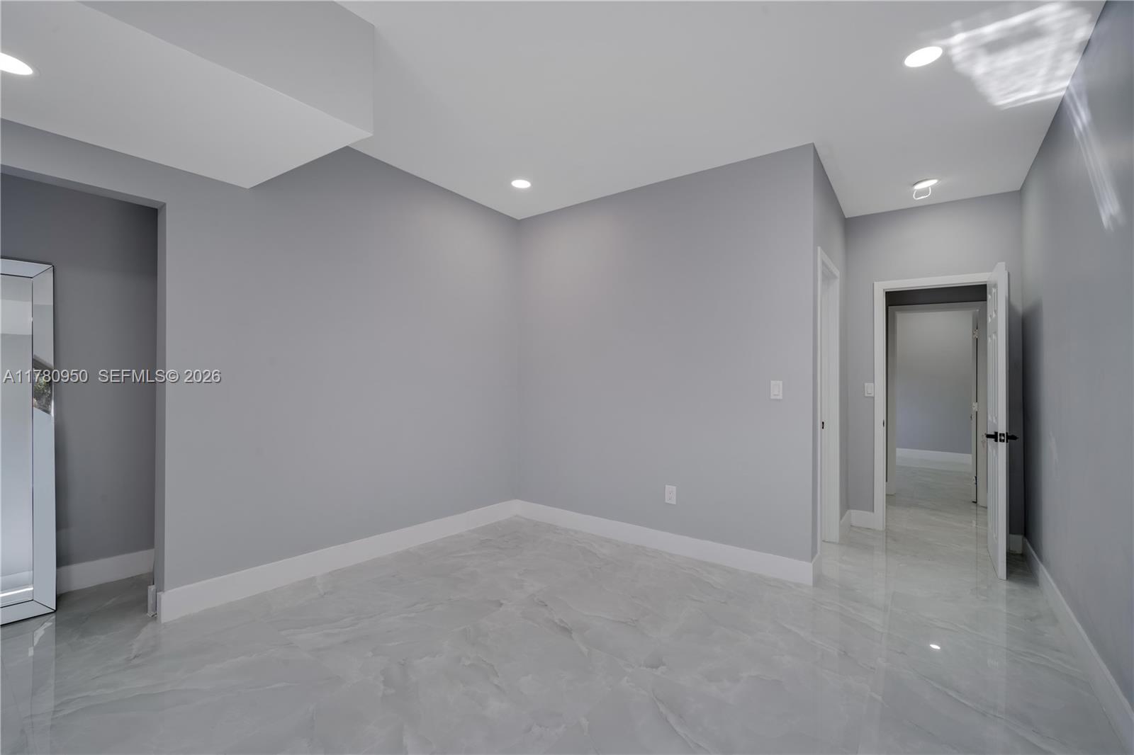 1114 Southwest 13th Court Miami, FL 33135 - Photo 23 of 43 a view of an empty room