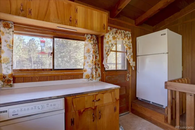 a view of walk in closet with window